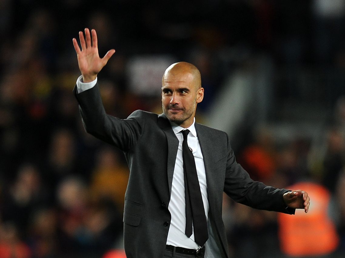Guardiola gestures to the crowd after completing his four seasons as coach of FC Barcelona after the Spanish league football match FC Barcelona vs RCD Espanyol on May 5, 2012 at the Camp Nou stadium in Barcelona. AFP PHOTO/LLUIS GENE        (Photo credit should read LLUIS GENE/AFP/GettyImages)